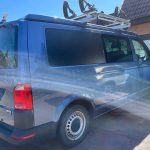 Offside of a Blue 2020 VW Transporter T6 LWB Campervan Sanna Layout, 16000 Miles.