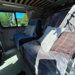 Rear Seats of a Blue 2020 VW Transporter T6 LWB Campervan Sanna Layout, 16000 Miles.