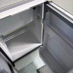 Open Fridge of a Grey 2016 VW Transporter T6 Jerba Campervan LWB, 53,500 Miles.